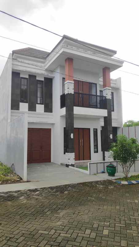 dijual rumah singhamerta residence