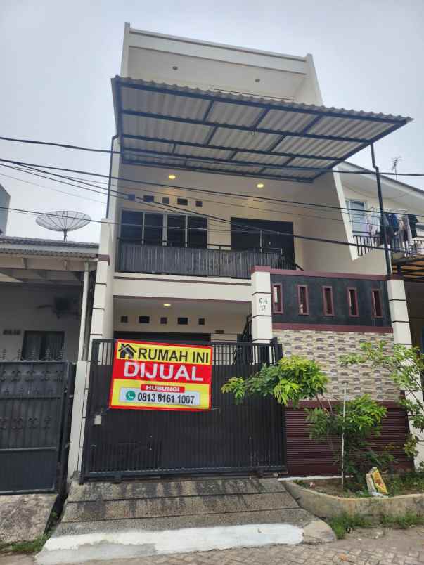 dijual rumah taman kencana