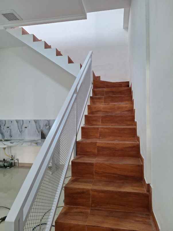 dijual rumah tytian kencana marga mulya