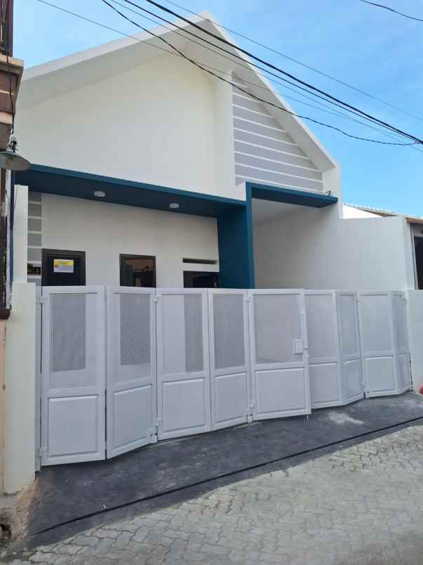 dijual rumah tytian kencana marga mulya