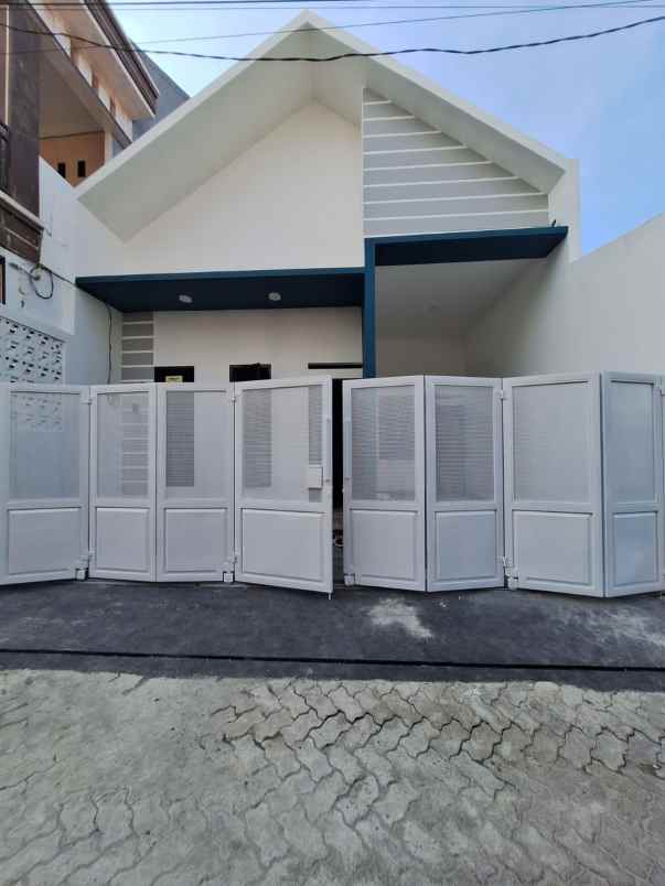 dijual rumah tytian kencana marga mulya