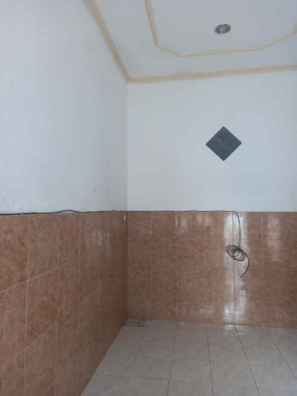 dijual rumah wiguna