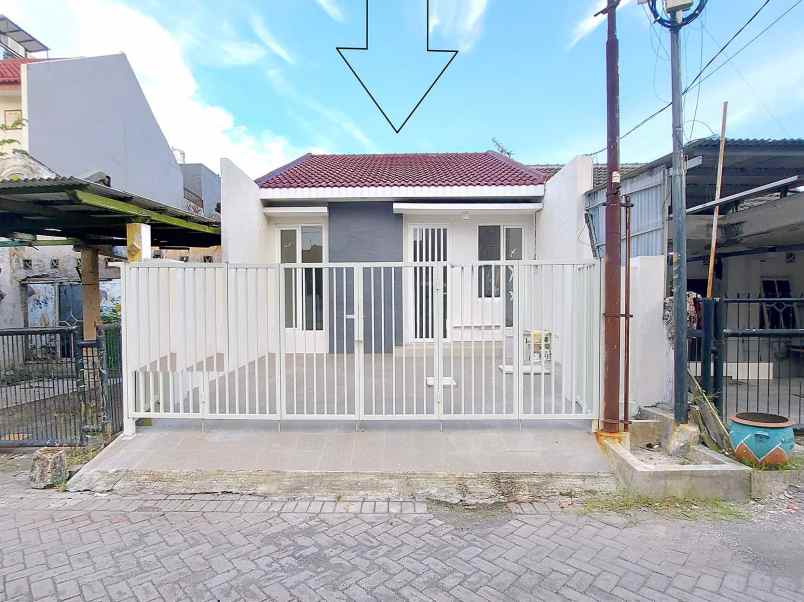 dijual rumah wiguna