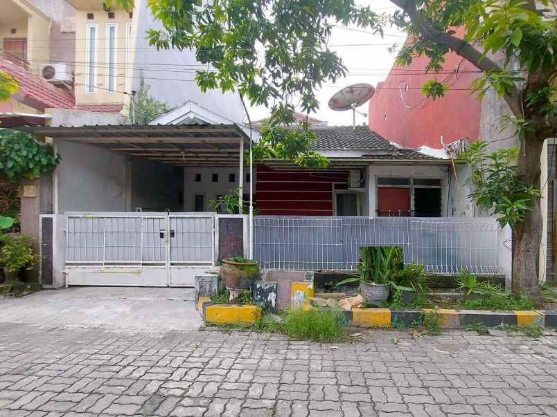 dijual rumah wiguna