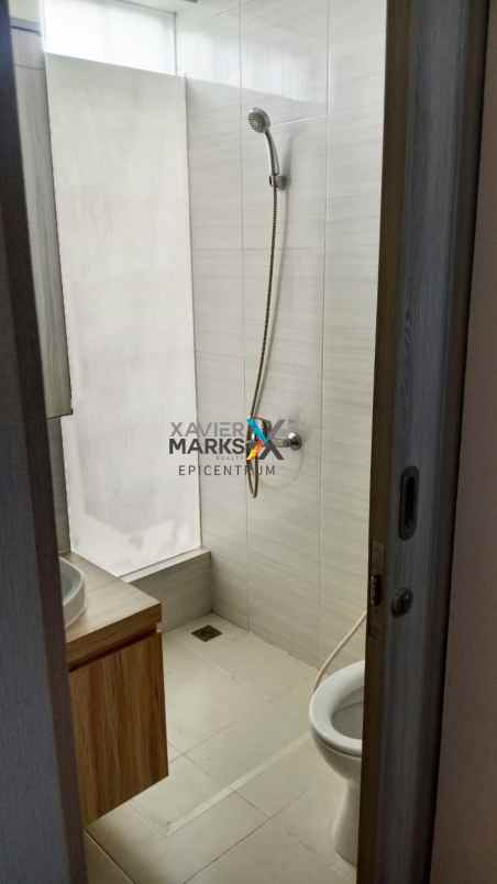 disewakan rumah queensland grand pakuwon new minimalis