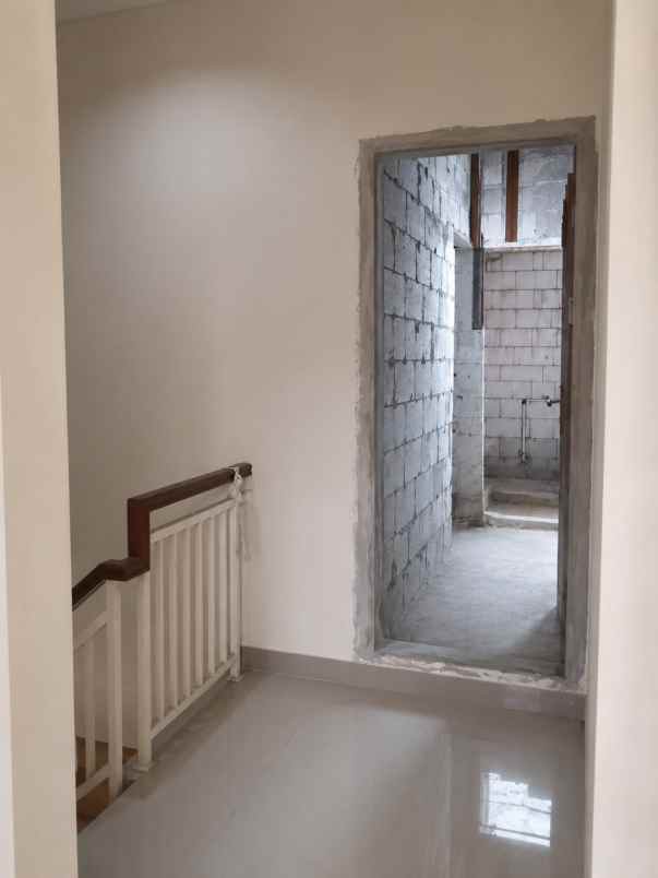 jual rumah 2 unit jadi 1 cluster di the royal park