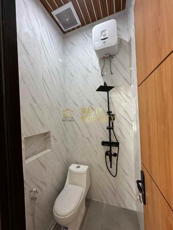 rumah modern dalam cluster di mlati sleman