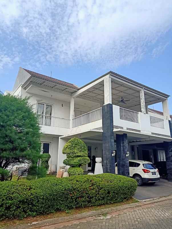 rumah modern rafles hills siap huni