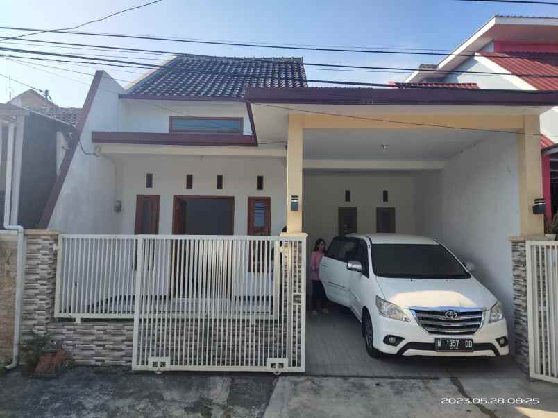 rumah modern siap huni di sawojajar 1