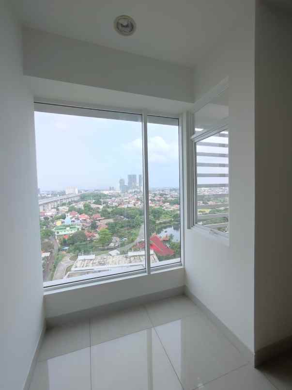 dijual apartemen baru unfurnished grand kamala lagoon