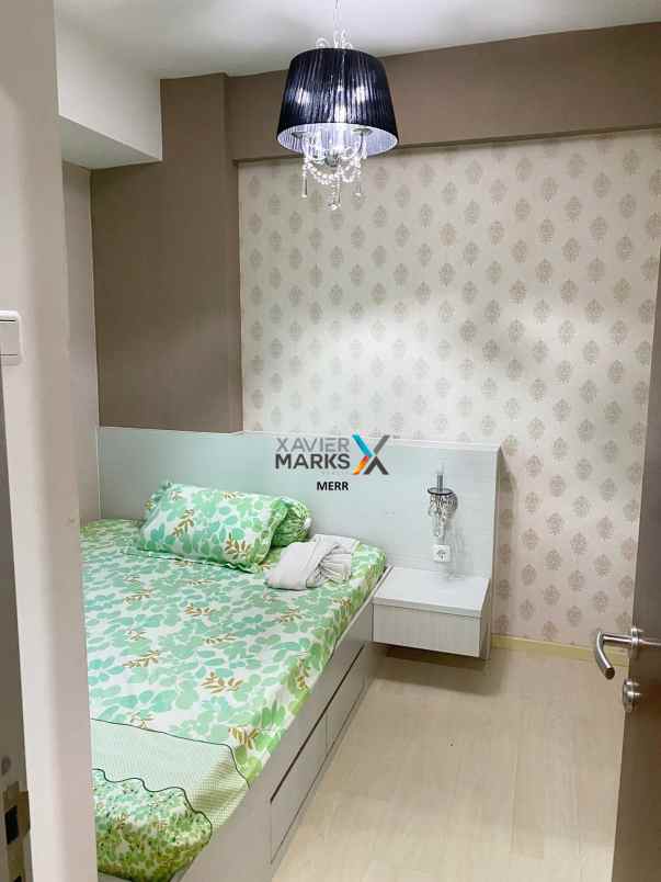 dijual apartemen gunawangsa manyar semi furnish 2 br