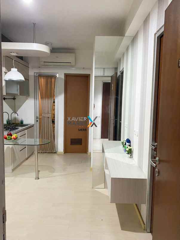 dijual apartemen gunawangsa manyar semi furnish 2 br