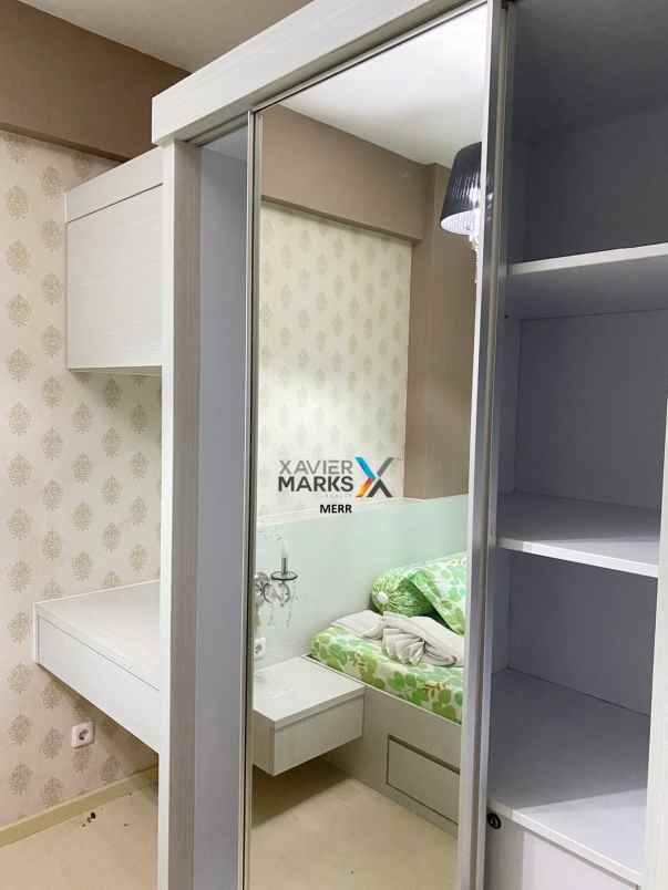 dijual apartemen gunawangsa manyar semi furnish 2 br