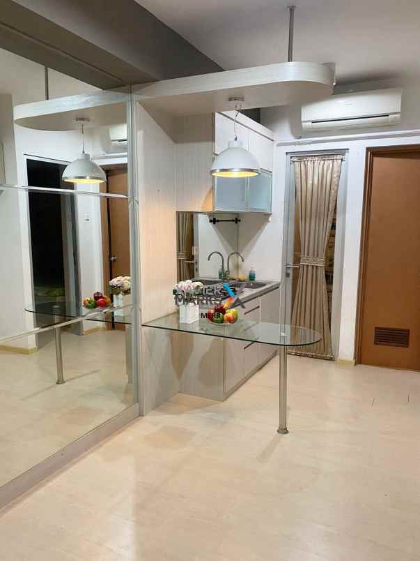 dijual apartemen gunawangsa manyar semi furnish 2 br