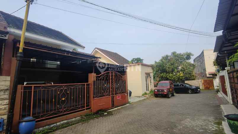 dijual rumah griya bunul