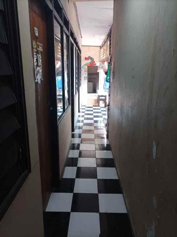 dijual rumah jalan badak