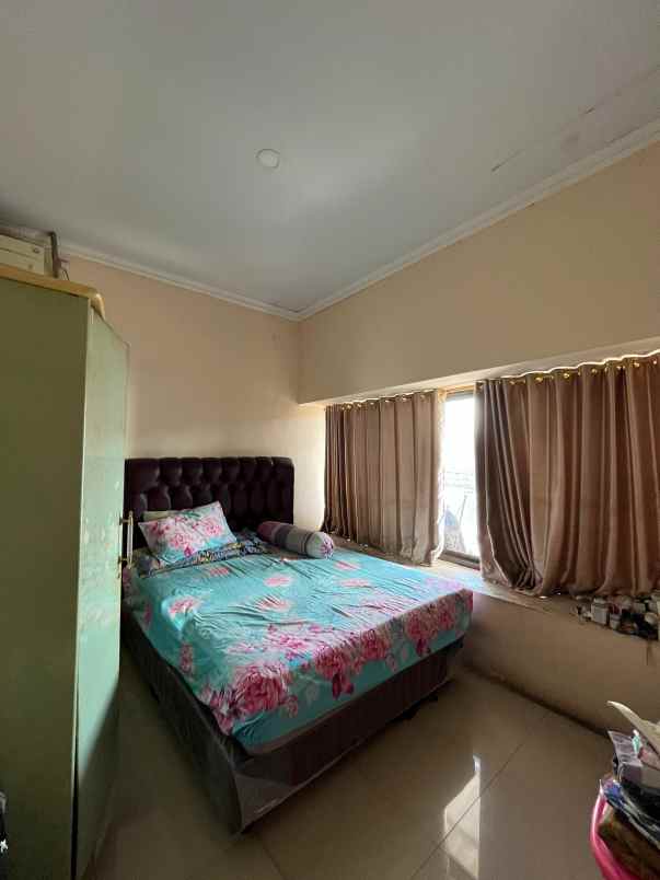 dijual rumah jalan teratai cibodas