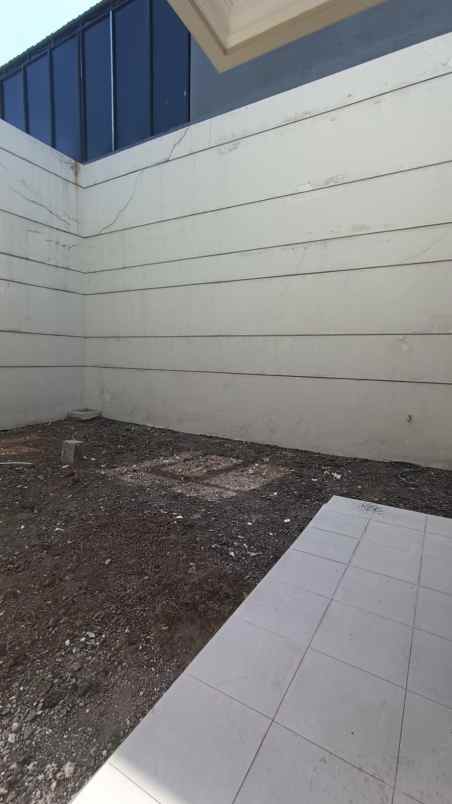 dijual rumah pakuwon city grand island