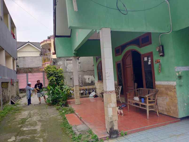 jual tanah beserta 2 bangunan rumah di atasnya