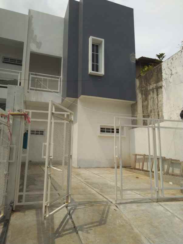 rumah jl h mencong komp peruri