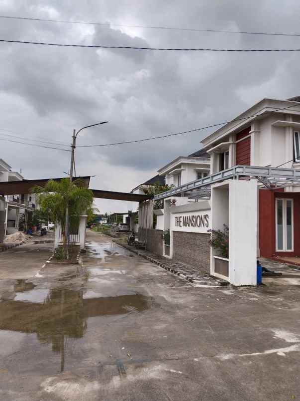 rumah jl raya kota harapan