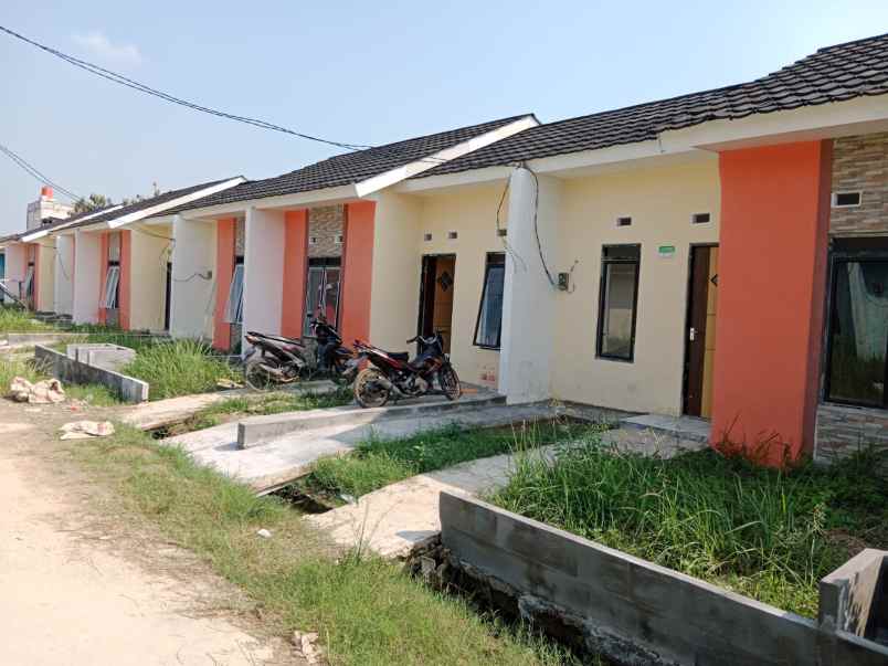 rumah jl raya turi sriamur