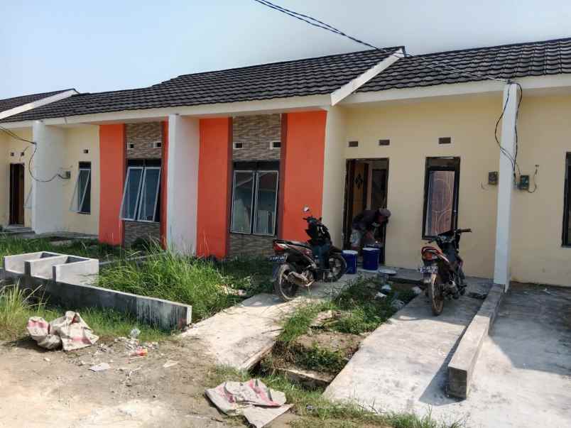 rumah jl raya turi sriamur