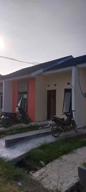 rumah jl raya turi sriamur