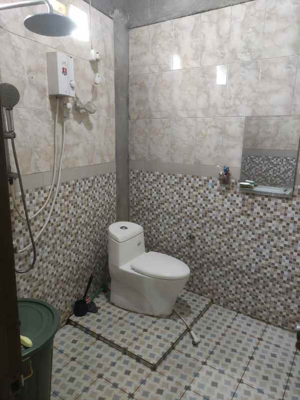 rumah modern 2 lantai siap huni