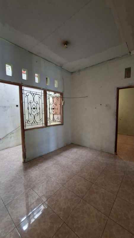 dijual rumah bumi sawangan indah
