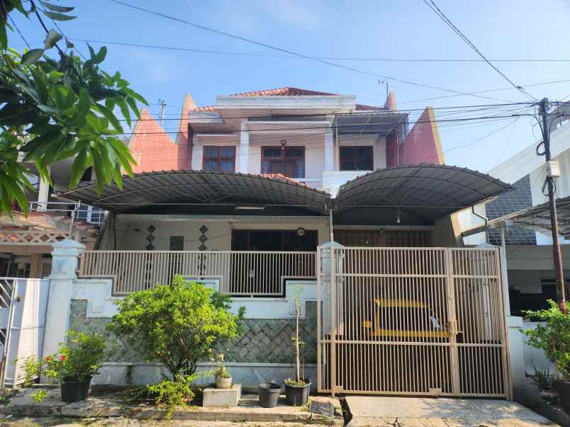dijual rumah wisma permai barat