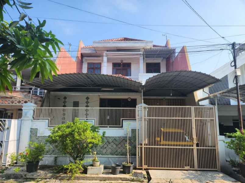dijual rumah wisma permai barat