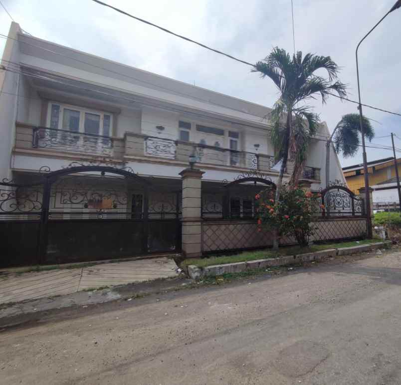 dijual rumah dharmahusada indah barat