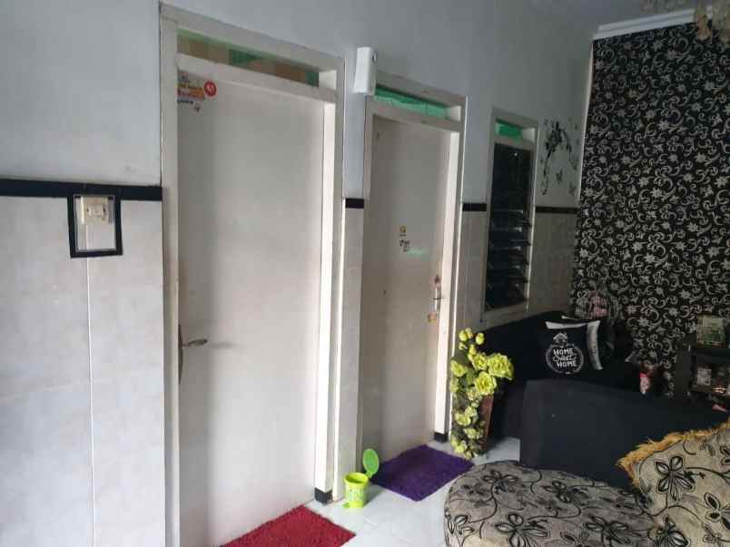 dijual rumah jalan titan asri