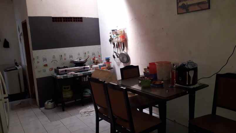 dijual rumah jalan titan asri