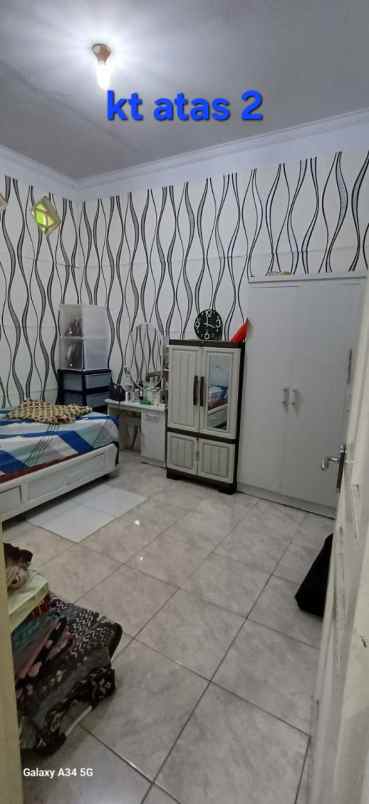 dijual rumah jl mawar merah perumnas