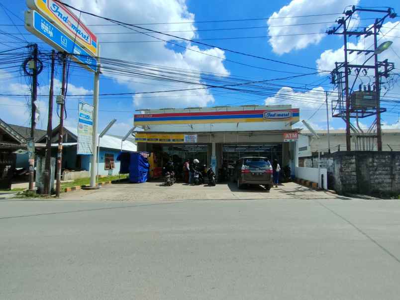 dijual tanah dan bangunan indomaret sako