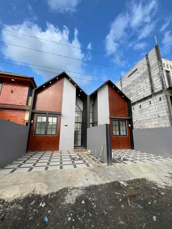 rumah cash kredit batas kota surabaya barat