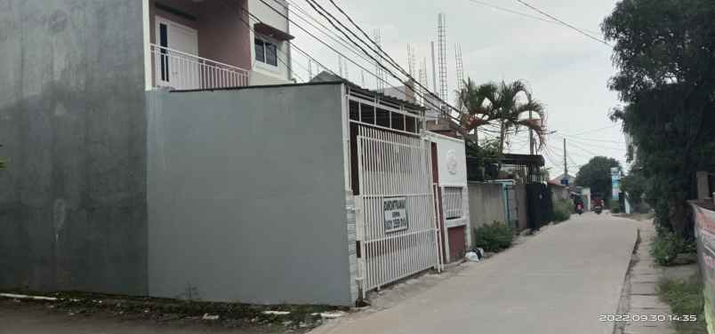 rumah jl h cari no 96