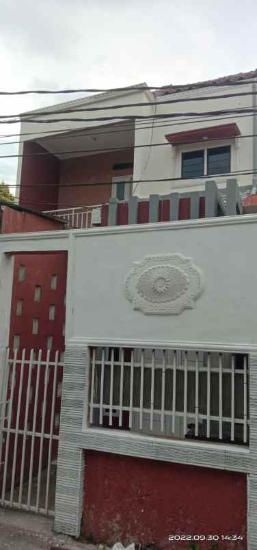 rumah jl h cari no 96