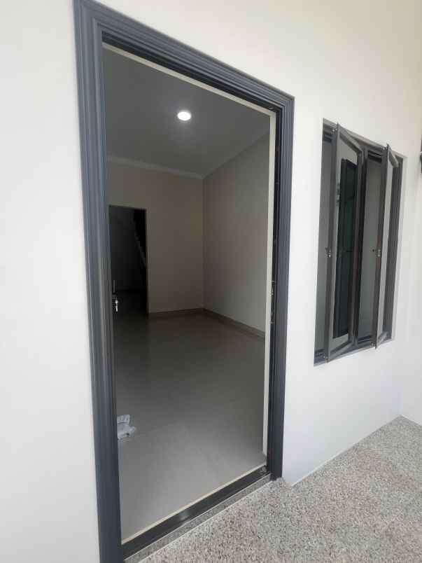 rumah jl komplek timah depok