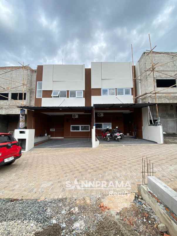 2 lantai 2 carport dalam cluster dekat tol limo rn