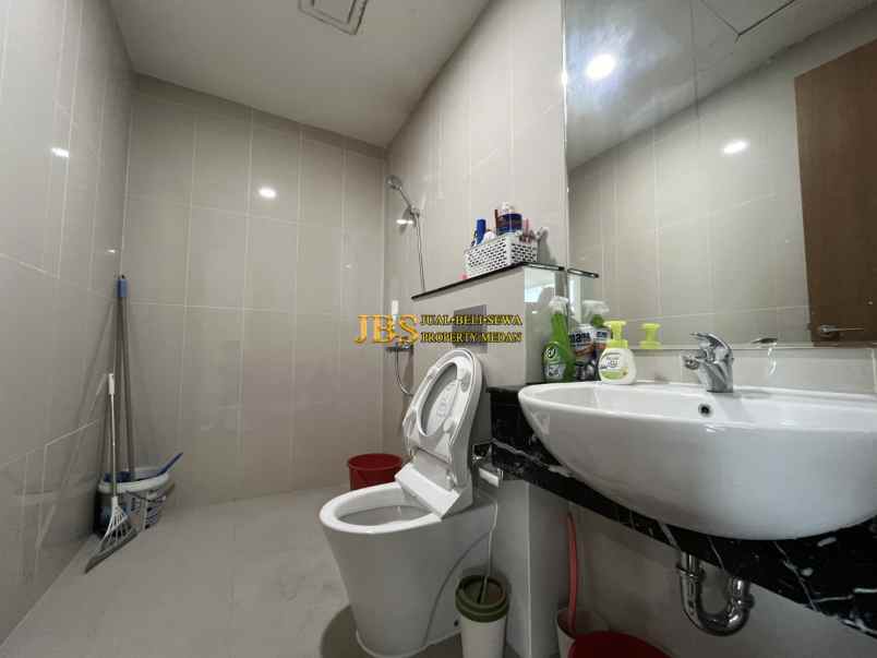 dijual apartemen the reiz condo