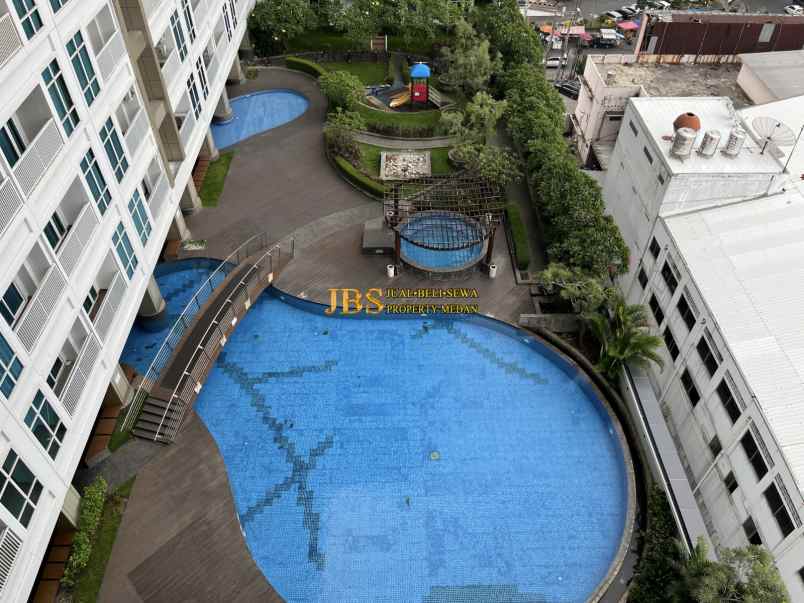 dijual apartemen the reiz condo