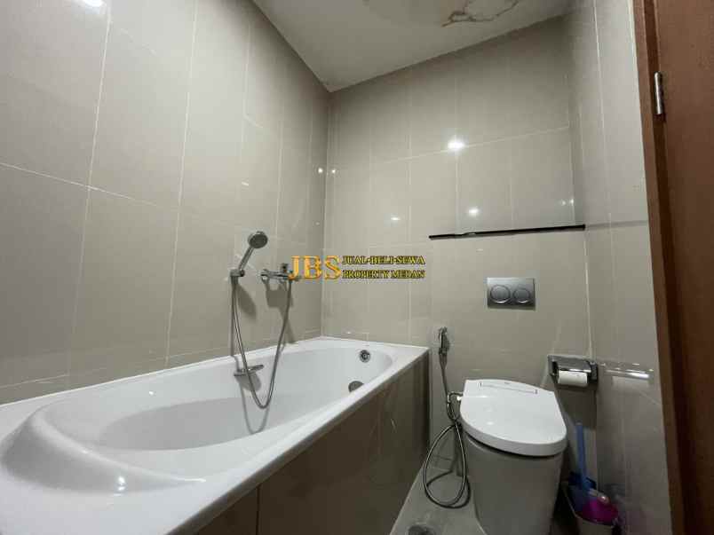 dijual apartemen the reiz condo