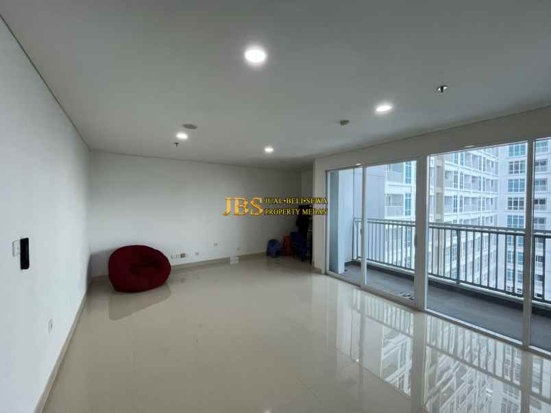 dijual apartemen the reiz condo