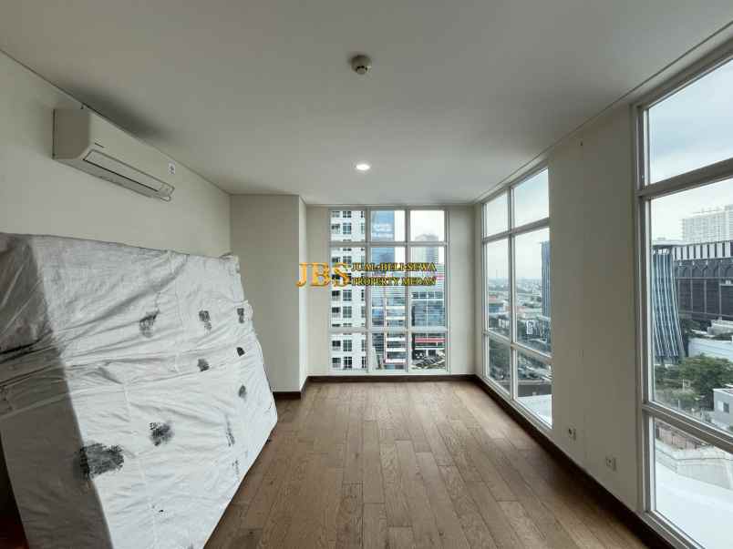 dijual apartemen the reiz condo