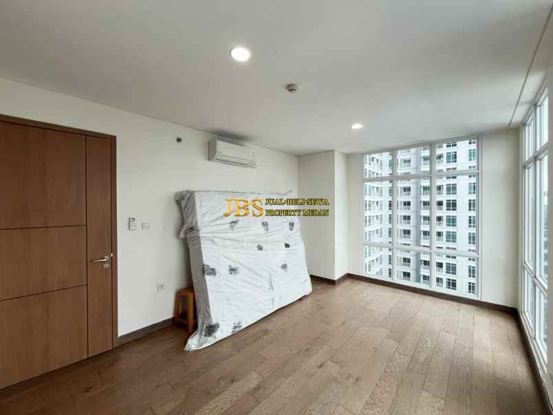 dijual apartemen the reiz condo