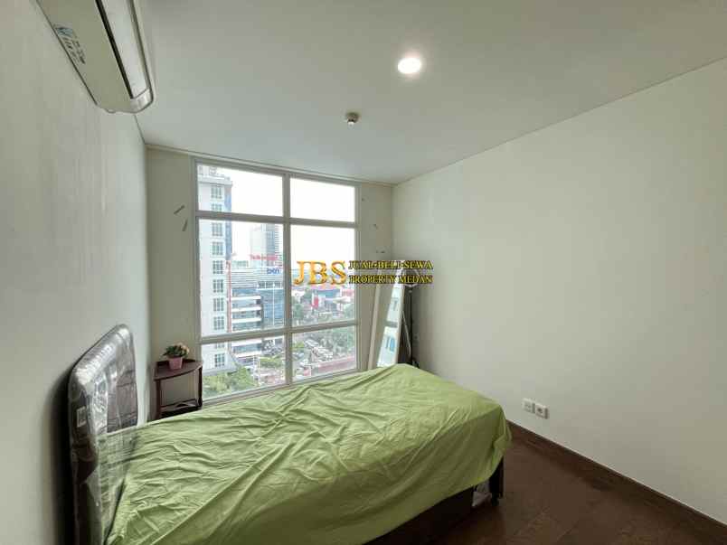 dijual apartemen the reiz condo