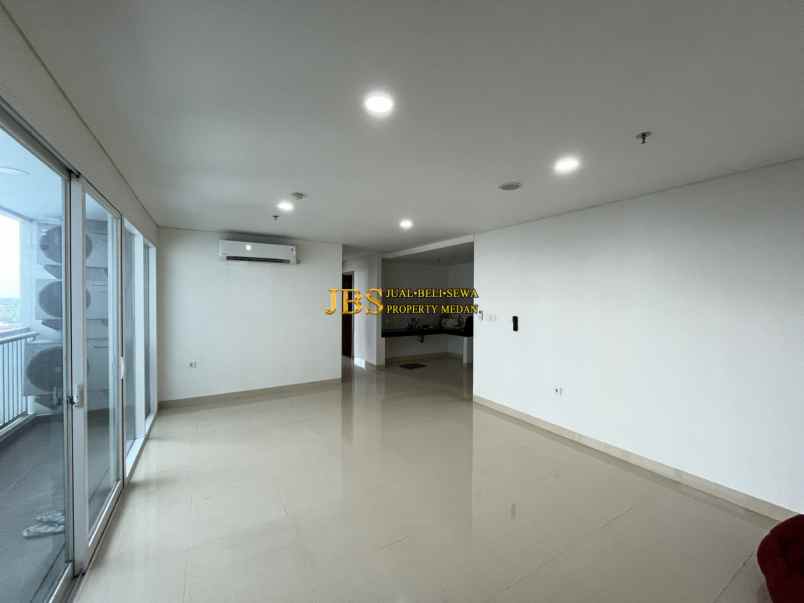 dijual apartemen the reiz condo